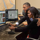 Image for article titled Obama Gently Guides Michelle’s Hand As She Maneuvers Drone Joystick